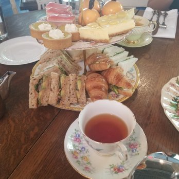 Neverland Tea Salon - The demi tea option vegetarian. The top tier has all of the sweets (yum!) and the bottom tier has the savory options (not my fave) - Coffee & Tea Near Me - Vancouver, British Columbia