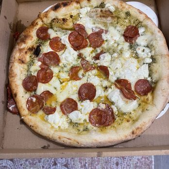 Pizzeria Pulcinella - Thin fire crust pizza with tomatoes, mozzarella and goat cheese excellent taste - Pizza Near Me - Seattle, Washington Pizzeria Pulcinella - Thin fire crust pizza with tomatoes, mozzarella and goat cheese excellent taste - Pizza Near Me - Seattle, Washington
