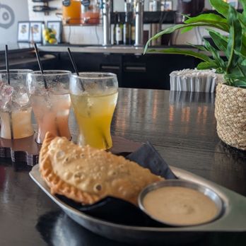 Savor 100x35 - Empanada Beef w/sweet plantains. Sangria flight - Puerto Rican Near Me - North Port, Florida Savor 100x35 - Empanada Beef w/sweet plantains. Sangria flight - Puerto Rican Near Me - North Port, Florida