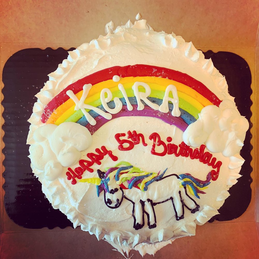 Ice cream cake with a rainbow and a unicorn! Ice cream cake with a rainbow and a unicorn!