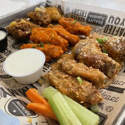 Lemon pepper, hot Buffalo, and satay wings.