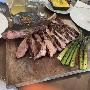 Sauvage - Tomahawk steak with asparagus and macaroni and cheese - Southern Near Me - Shreveport, Louisiana Sauvage - Tomahawk steak with asparagus and macaroni and cheese - Southern Near Me - Shreveport, Louisiana