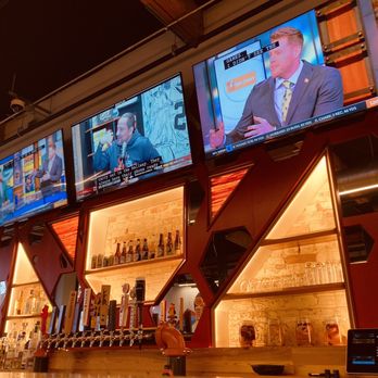 Oddfellows - a bar with several televisions on the wall - Pizza Near Me - Portsmouth, Ohio Oddfellows - a bar with several televisions on the wall - Pizza Near Me - Portsmouth, Ohio