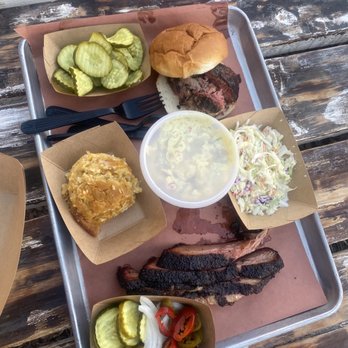 Caldwell County BBQ - Pulled Pork Sandwich, 1 lb. Brisket, Lemon Poppyseed Coleslaw, Aunt Susan's Corn Casserole - Barbeque Near Me - Gilbert, Arizona Caldwell County BBQ - Pulled Pork Sandwich, 1 lb. Brisket, Lemon Poppyseed Coleslaw, Aunt Susan's Corn Casserole - Barbeque Near Me - Gilbert, Arizona