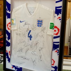 inPicture - InPicture framed Steve Gerrard's England jersey fully signed by all of the England squad.