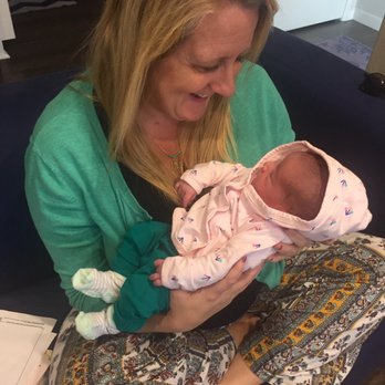 Transformative Birth Midwifery - Christina admiring our one-week old baby - Midwives Near Me - Winchester, California Transformative Birth Midwifery - Christina admiring our one-week old baby - Midwives Near Me - Winchester, California