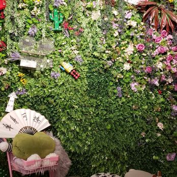 Monster L Karaoke - a green wall with plants and animals - Karaoke Near Me - Richmond, British Columbia Monster L Karaoke - a green wall with plants and animals - Karaoke Near Me - Richmond, British Columbia
