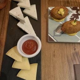 Cheese plate and vegan chicken croquettes Cheese plate and vegan chicken croquettes