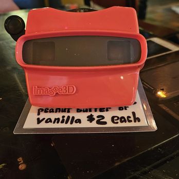 Satchel's Pizza - Dessert menu and a old school toy to view the menu. - Pizza Near Me - Gainesville, Florida Satchel's Pizza - Dessert menu and a old school toy to view the menu. - Pizza Near Me - Gainesville, Florida
