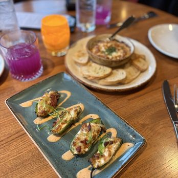 Cutters Crabhouse - Happy Hour crab stuffed jalapeños & crab artichoke dip - Seafood Near Me - Seattle, Washington Cutters Crabhouse - Happy Hour crab stuffed jalapeños & crab artichoke dip - Seafood Near Me - Seattle, Washington