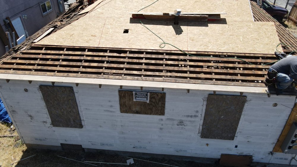 Slide of Cosmic Renovation & Roofing