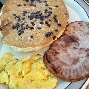 Squeeze In - Chocolate chip pancake with eggs and side of ham - Breakfast & Brunch Near Me - Reno, Nevada Squeeze In - Chocolate chip pancake with eggs and side of ham - Breakfast & Brunch Near Me - Reno, Nevada