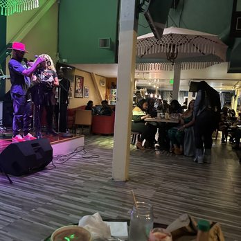 Qs Lounge - a band playing on stage - Lounges Near Me - Oakland, California Qs Lounge - a band playing on stage - Lounges Near Me - Oakland, California