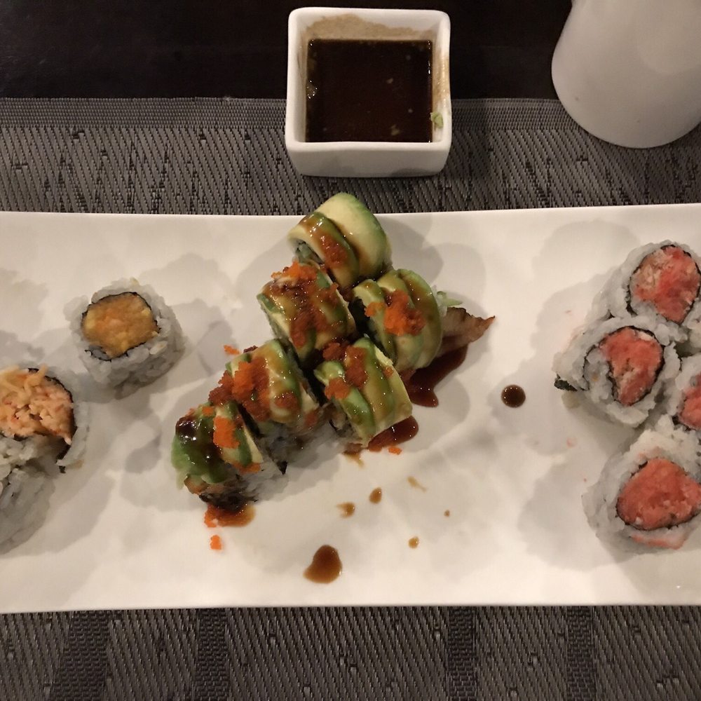 Kumo Japanese Cuisine - Dragon roll center. Spicy tuna right. Spicy crab left. - Japanese Near Me - Depew, New York Kumo Japanese Cuisine - Dragon roll center. Spicy tuna right. Spicy crab left. - Japanese Near Me - Depew, New York