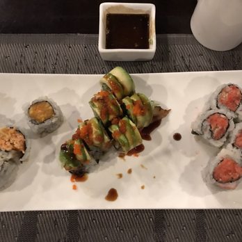 Kumo Japanese Cuisine - Dragon roll center. Spicy tuna right. Spicy crab left. - Japanese Near Me - Depew, New York Kumo Japanese Cuisine - Dragon roll center. Spicy tuna right. Spicy crab left. - Japanese Near Me - Depew, New York