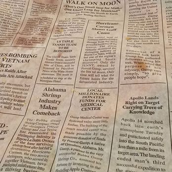 Bubba Gump Shrimp - "Newspaper" under the garlic bread - Seafood Near Me - Anaheim, California