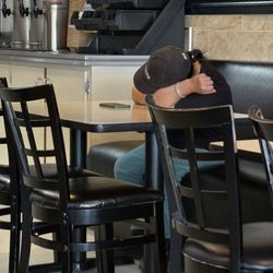 Tokyo Express - The owner sleeping on a table!