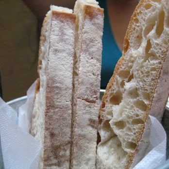 Uva - bread (comes with fruity olive oil) - Italian Near Me - New York, New York Uva - bread (comes with fruity olive oil) - Italian Near Me - New York, New York