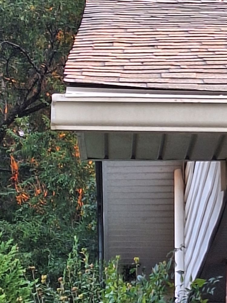 Slide of Storm Pros Roofing and Construction