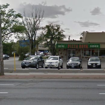 Pizza Nova - a parking lot with cars parked in front of it - Italian Near Me - Toronto, Ontario Pizza Nova - a parking lot with cars parked in front of it - Italian Near Me - Toronto, Ontario