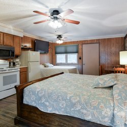 Quail Cove Resort - Our Economy Cabins are the perfect fit for your large group! Cooking, relaxing, and enjoying your stay are all within reach!