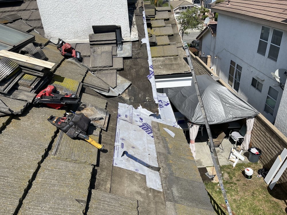 Slide of Prestige Worldwide Roofing