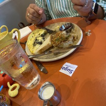 Snooze, an A.M. Eatery - Over medium eggs, sausage, hash browns, sour dough toast - Breakfast & Brunch Near Me - Addison, Texas