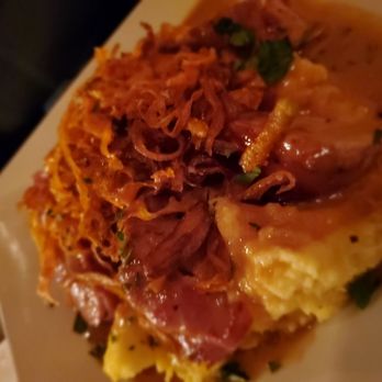 Celtic Cavern - Bacon wrapped pork over grits - Gastropubs Near Me - Middletown, Connecticut Celtic Cavern - Bacon wrapped pork over grits - Gastropubs Near Me - Middletown, Connecticut