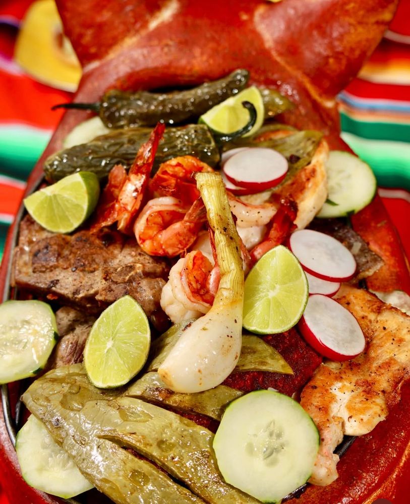 Banquetes Dona Cheli Logo