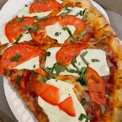 Natale's Pizzeria - The saddest slice of margherita pizza one has ever seen.