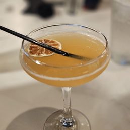 Cheers! This is the "Pretty Peachy" it has Four Roses Burbon, peach syrup, & a hint of ginger!