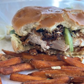 Crazy Pig Southern Kitchen - Kickin chicken sandwich with sweet potato fries - American Near Me - Mandeville, Louisiana