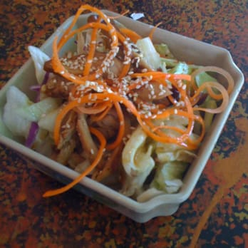 New Rice Bowl Express - iceberg lettuce, peanut oil, sesame seeds, and curly carrots. looks better then it tasted - Chinese Near Me - Carmichael, California