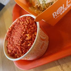 Roll Em Up Taquitos - Hot Cheetos corn in a cup