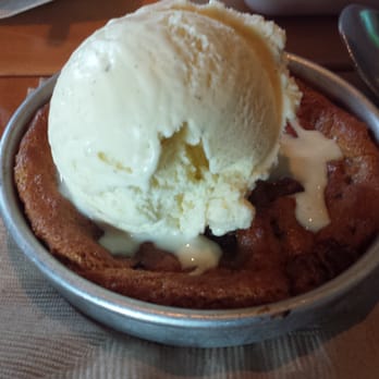 BJ's Restaurant & Brewhouse - Chocolate Chunk Pizookie - New American Near Me - Tuttle, Ohio BJ's Restaurant & Brewhouse - Chocolate Chunk Pizookie - New American Near Me - Tuttle, Ohio