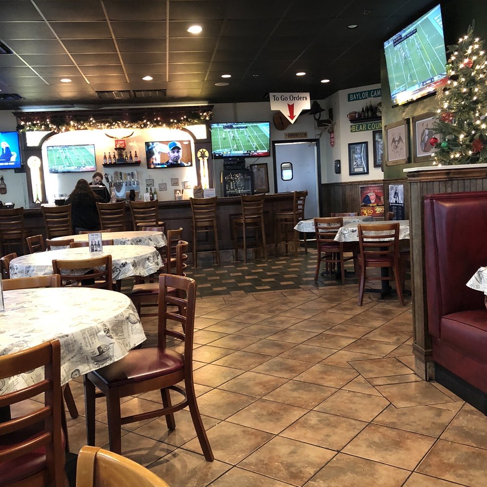 Poppa Rollo's Pizza - Part of the restaurant several televisions w the football on. - Pizza Near Me - Waco, Texas Poppa Rollo's Pizza - Part of the restaurant several televisions w the football on. - Pizza Near Me - Waco, Texas