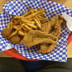 Bim Bam Burgers & Breakfast - Catfish dinner with spicy fries and hush puppies. Everything was hand breaded and hush puppies were homemade.