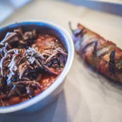 Strum's BBQ - Baked Beans and Bacon Wrapped Jalapeño that is stuffed.