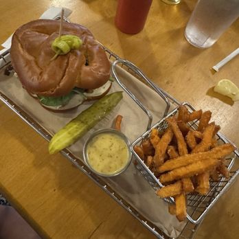 Hops Burger Bar - College Hill Blues Burger (pretzel bun) with Sweet Potato Fries - Burgers Near Me - Greensboro, North Carolina Hops Burger Bar - College Hill Blues Burger (pretzel bun) with Sweet Potato Fries - Burgers Near Me - Greensboro, North Carolina