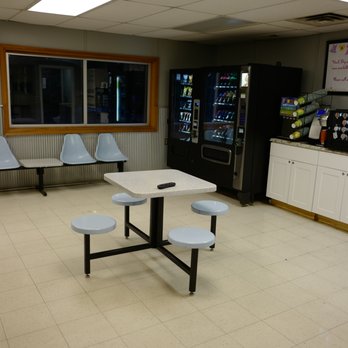 The Laundry Basket - Seating area with new vending machines including coffee and children options - Laundromat Near Me - Maynardville, Tennessee