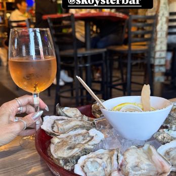 Siesta Key Oyster Bar - Happy Hour Oysters with a 9oz pour of rosé. - Seafood Near Me - Sarasota, Florida