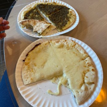 Nouri’s Restaurant - Manoushi zaatar and jibne(cheese) - Mediterranean Near Me - Paterson, New Jersey Nouri’s Restaurant - Manoushi zaatar and jibne(cheese) - Mediterranean Near Me - Paterson, New Jersey