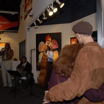 The Dewayne Oakley Blues Ensemble - a man in a bear suit hugging a woman - Jazz & Blues Near Me The Dewayne Oakley Blues Ensemble - a man in a bear suit hugging a woman - Jazz & Blues Near Me