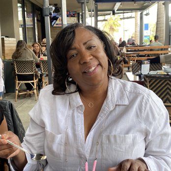The Olive Restobar - Birthday girl Jeri enjoying Bread Pudding dessert and Ice cream delicious - Mediterranean Near Me - Downey, California