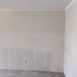 S&S Taping & Drywall - Den drywalled and texcoated after being cut for pipe leak.