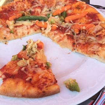 Madar Cafe - Severely undercooked pizza. - Cafes Near Me - Melk, 3