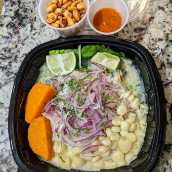 Mi Perú Peruvian Cuisine - Ceviche de Tilapia ($15.99) - fresh raw diced tilapia marinated in lime juice, served with Peruvian corn, sweet potato, lettuce, and onions. - Peruvian Near Me - Durham, North Carolina