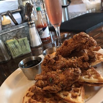 Toast - Chicken and Waffles! Served with syrup and Cajun butter! - Breakfast & Brunch Near Me - New Orleans, Louisiana Toast - Chicken and Waffles! Served with syrup and Cajun butter! - Breakfast & Brunch Near Me - New Orleans, Louisiana