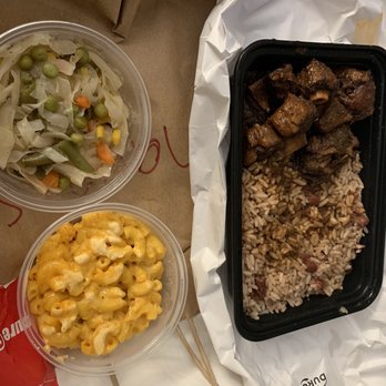 Jerk Off The Grill - Steamed Cabbage, Mac and Cheese, Oxtails, and Rice and Peas - Caribbean Near Me - New York, New York Jerk Off The Grill - Steamed Cabbage, Mac and Cheese, Oxtails, and Rice and Peas - Caribbean Near Me - New York, New York