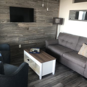 The Breeze Beachfront Resort - Cozy living room with pull out couch - RV Parks Near Me - Surfside Beach, Texas The Breeze Beachfront Resort - Cozy living room with pull out couch - RV Parks Near Me - Surfside Beach, Texas